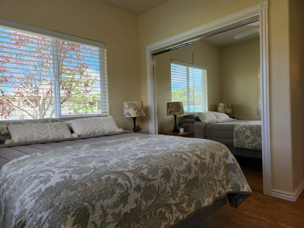 1507 Haleloke Street Hilo, HI 96720 - Photo 9 of 21 a large bed sitting in a bedroom next to a window