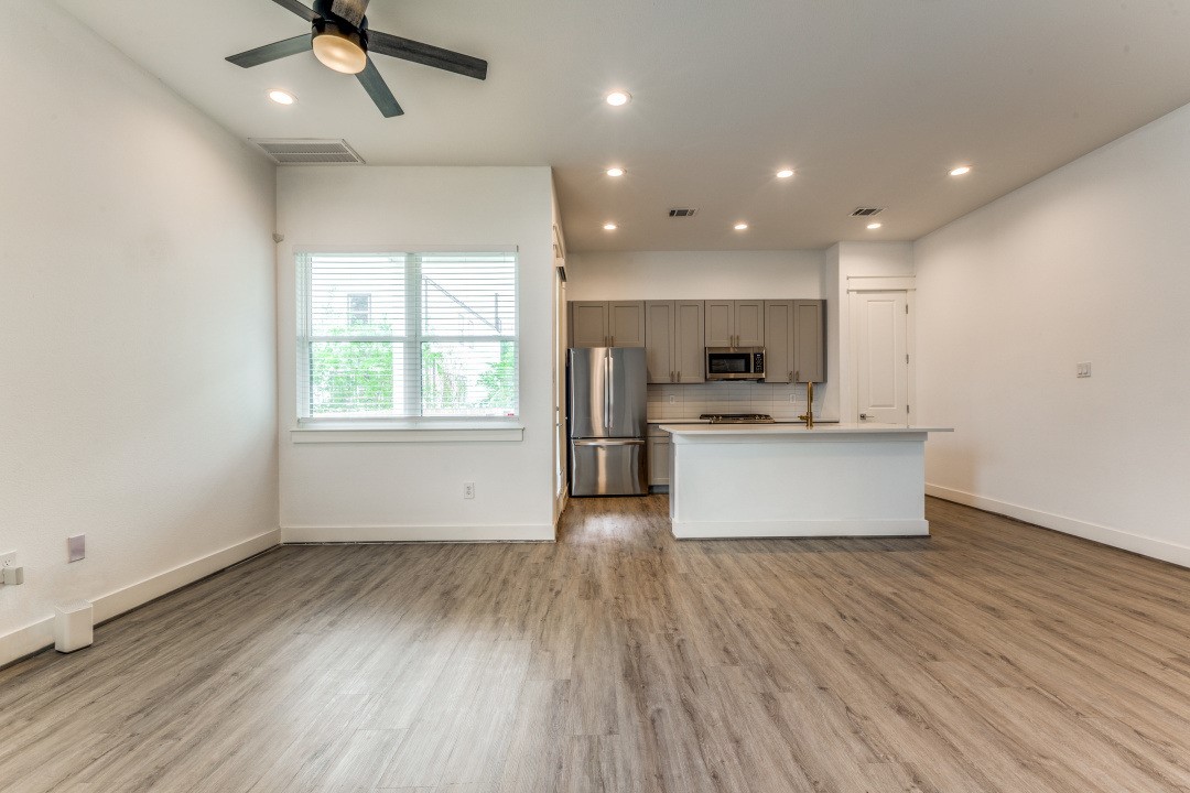 728 East 38th Street Houston, TX 77022 - Photo 4 of 18 As you enter, you are welcomed by an impressive open-concept living area designed for seamless everyday living and entertaining. Bright, airy interiors feature recessed lighting and LVP flooring throughout for a clean, contemporary feel.