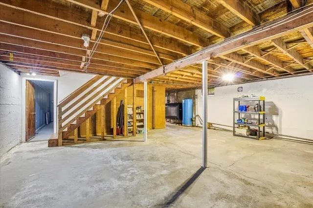 a view of a room with wooden walls