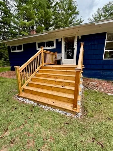 a view of a house with a large window