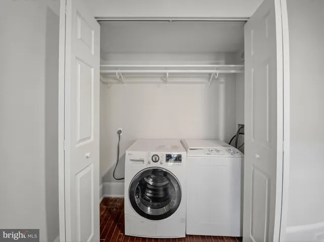 a utility room with dryer and washer