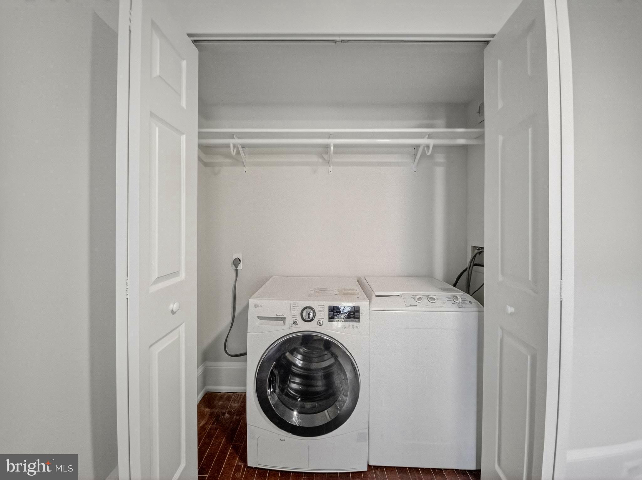1765 U Street Northwest, Unit 2 Washington, DC 20009 - Photo 13 of 16 a utility room with dryer and washer