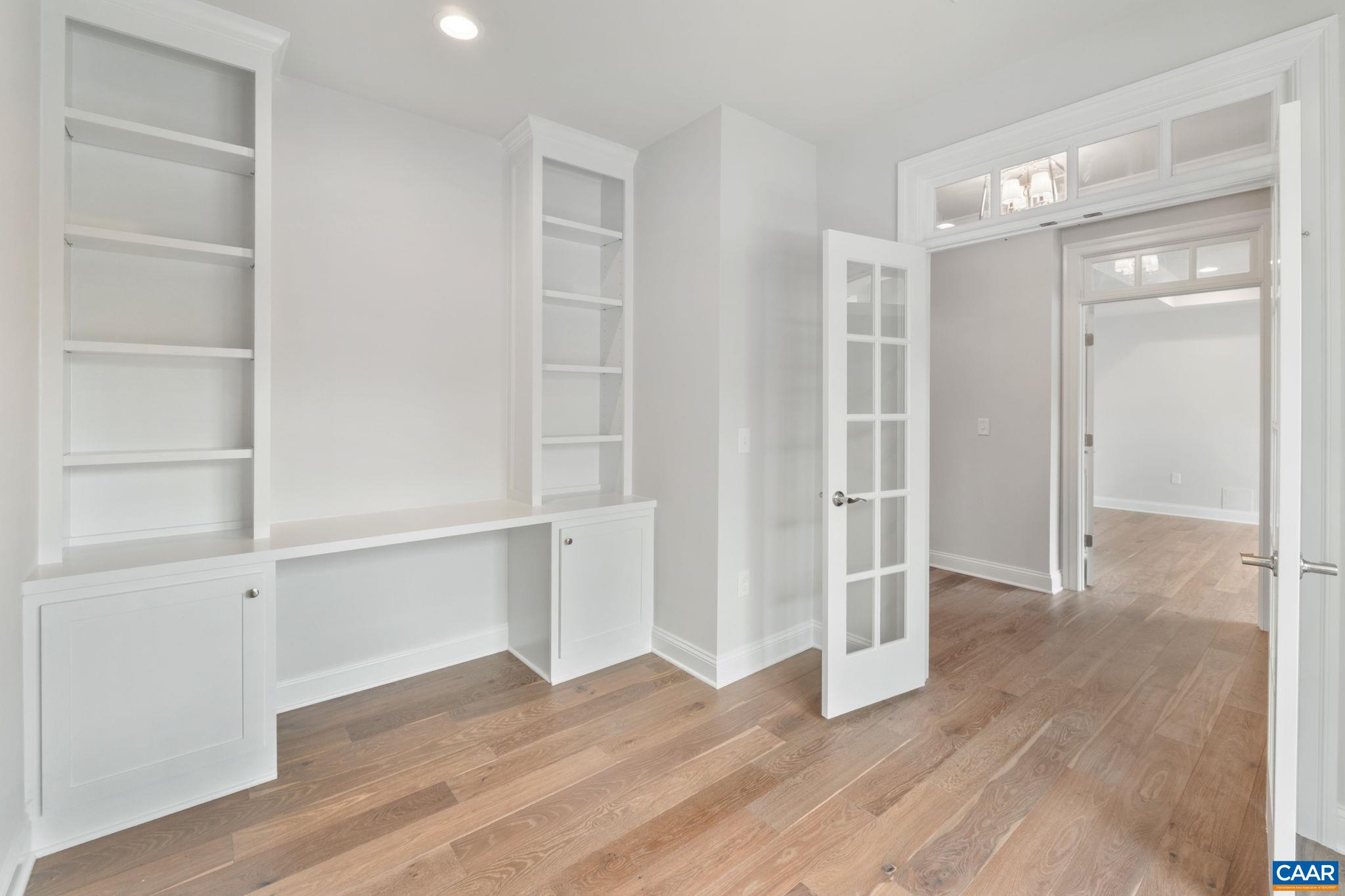 939 Addle Hill Road Crozet, VA 22932 - Photo 12 of 40 a view of an empty room with wooden floor