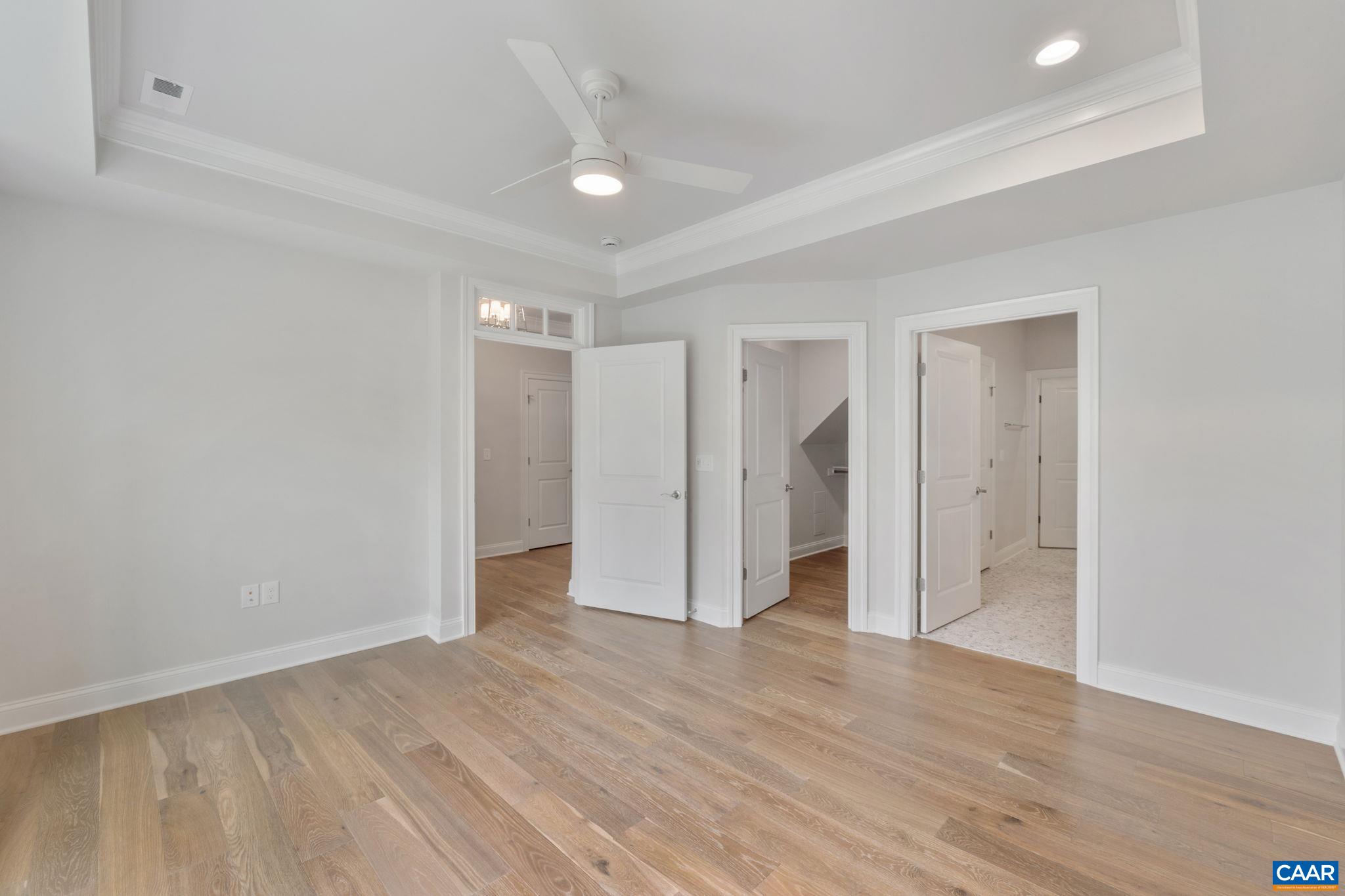 939 Addle Hill Road Crozet, VA 22932 - Photo 14 of 40 a view of an empty room with wooden floor