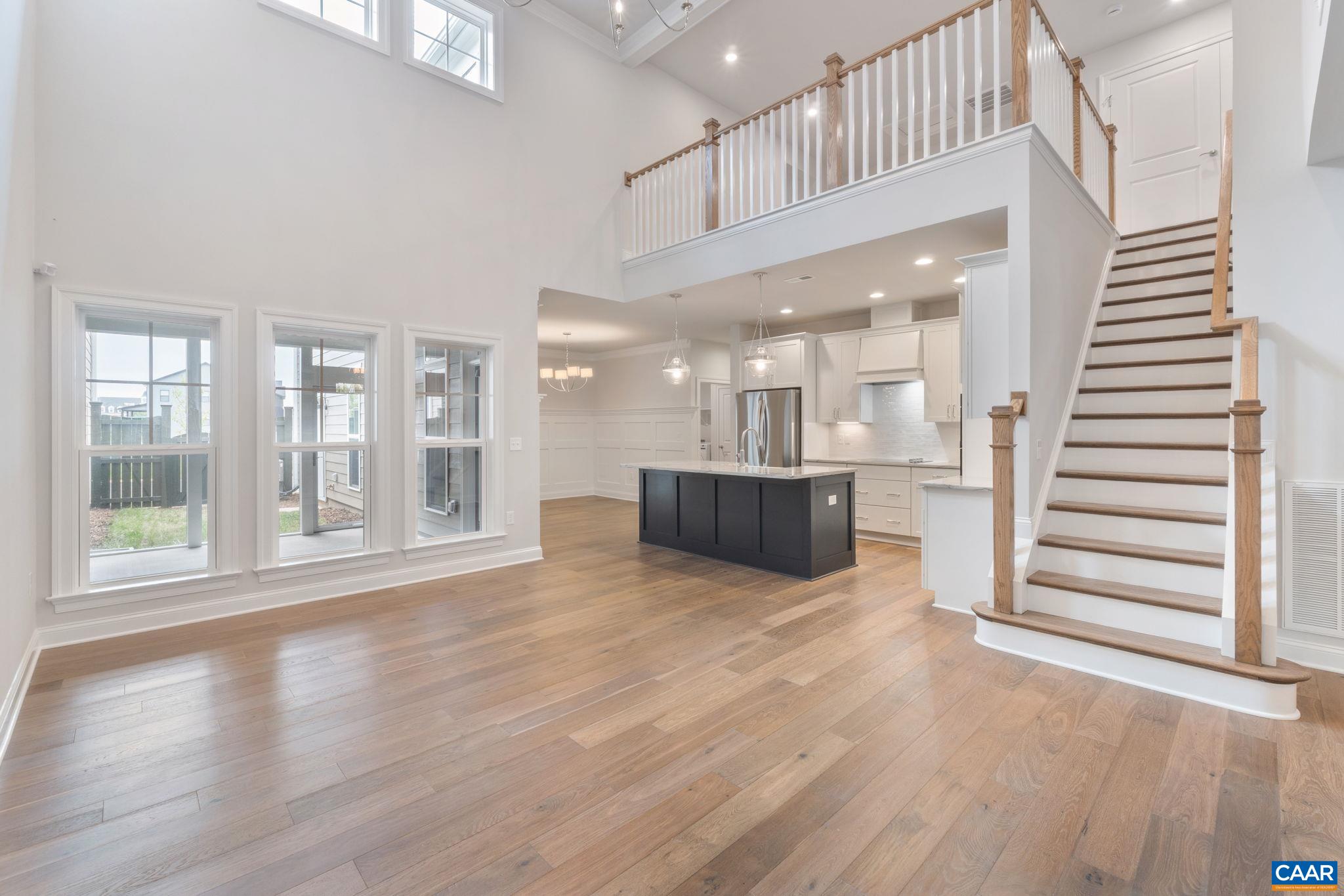 939 Addle Hill Road Crozet, VA 22932 - Photo 17 of 40 a big room with wooden floor and windows
