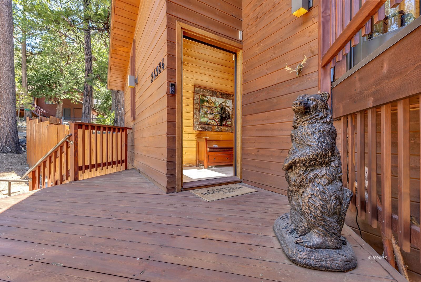 24924 Fern Valley Road Idyllwild, CA 92549 - Photo 10 of 72 a view of a porch with wooden floor and a stairs