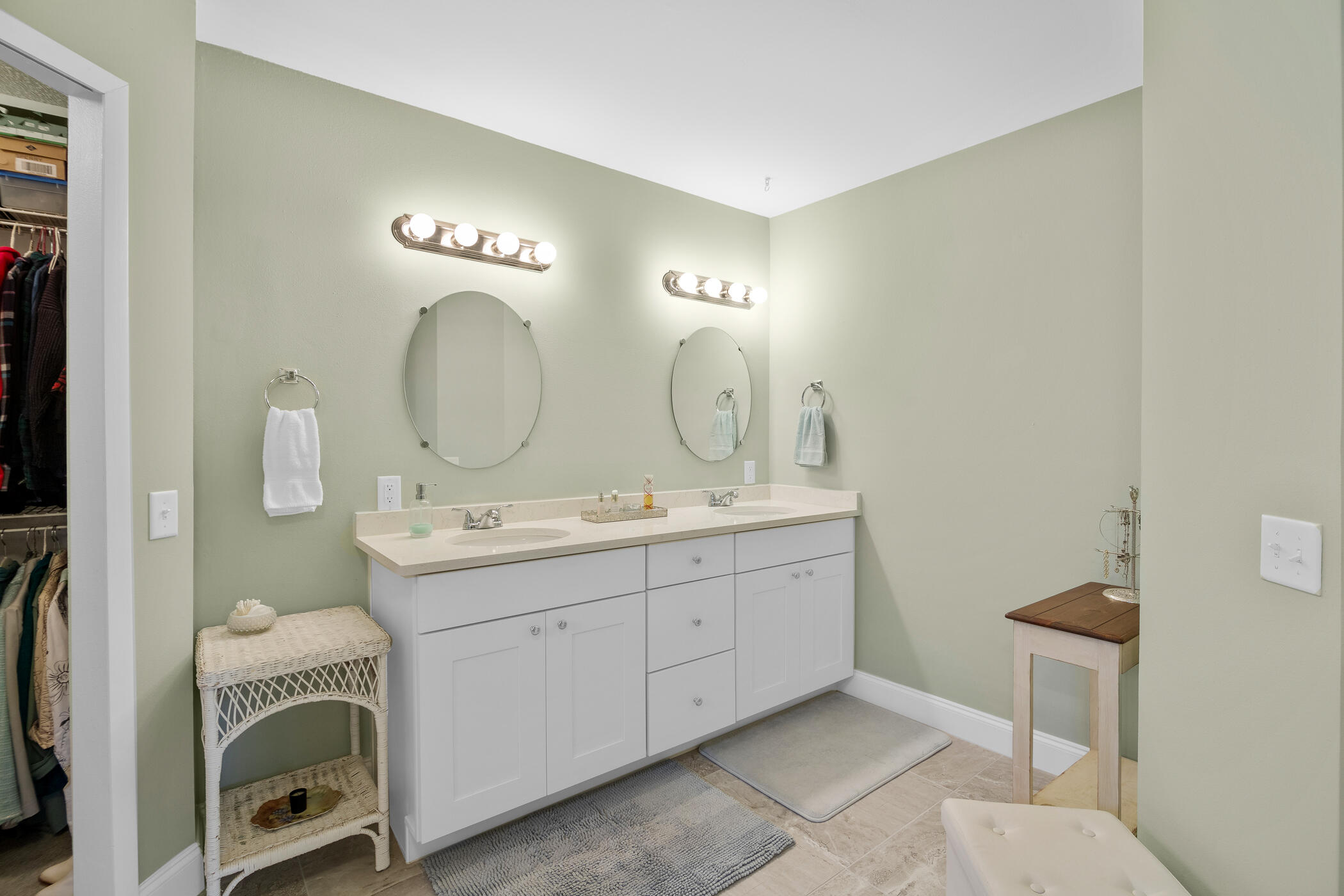 849 Gardener Road Rockledge, FL 32955 - Photo 15 of 31 a bathroom with a double vanity sink and a mirror
