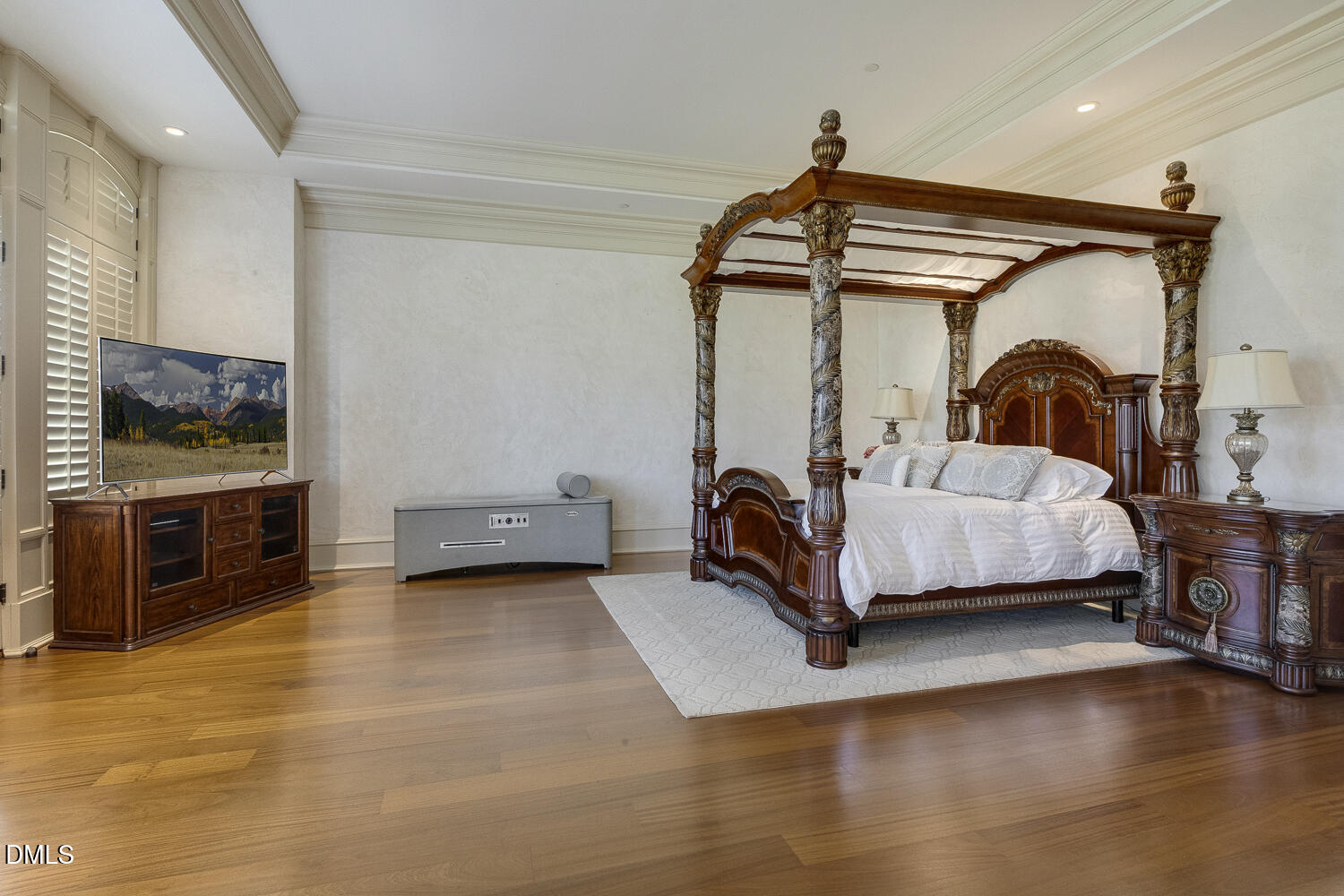 7505 New Sharon Church Road Rougemont, NC 27572 - Photo 45 of 99 a bedroom with a bed and a flat tv screen on wall