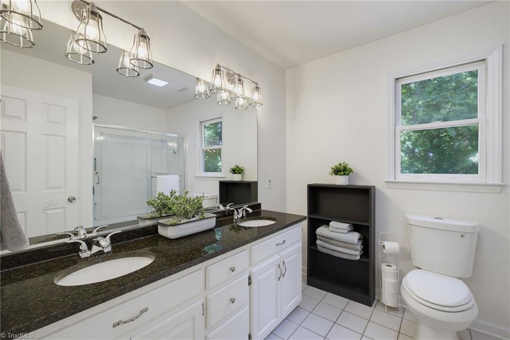2800 Spencers Grove Road Browns Summit, NC 27214 - Photo 35 of 49 Full 2 sink bathroom with granite upstairs.