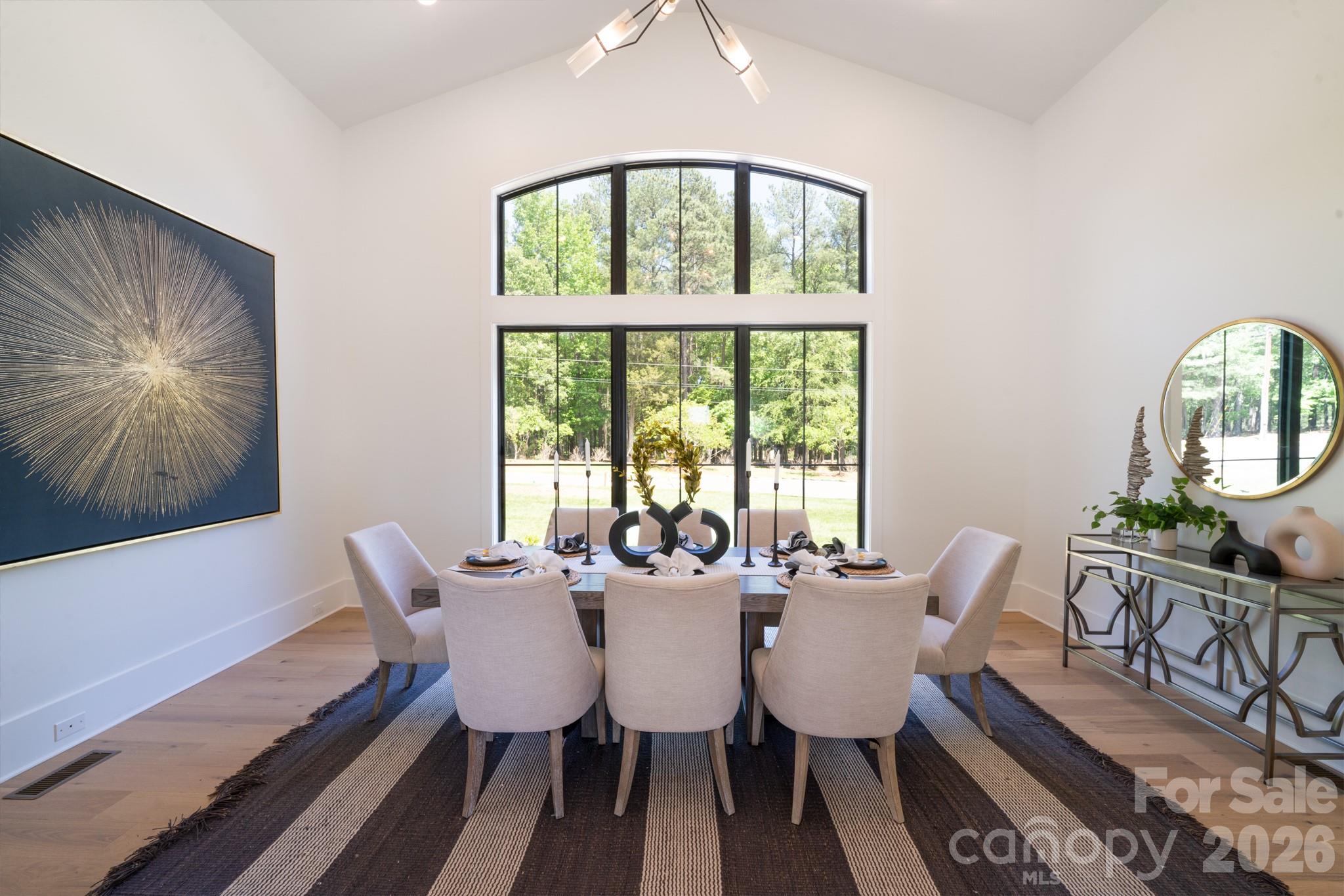 18304 Rosapenny Road Charlotte, NC 28278 - Photo 13 of 48 a view of a dining room with furniture window and outside view