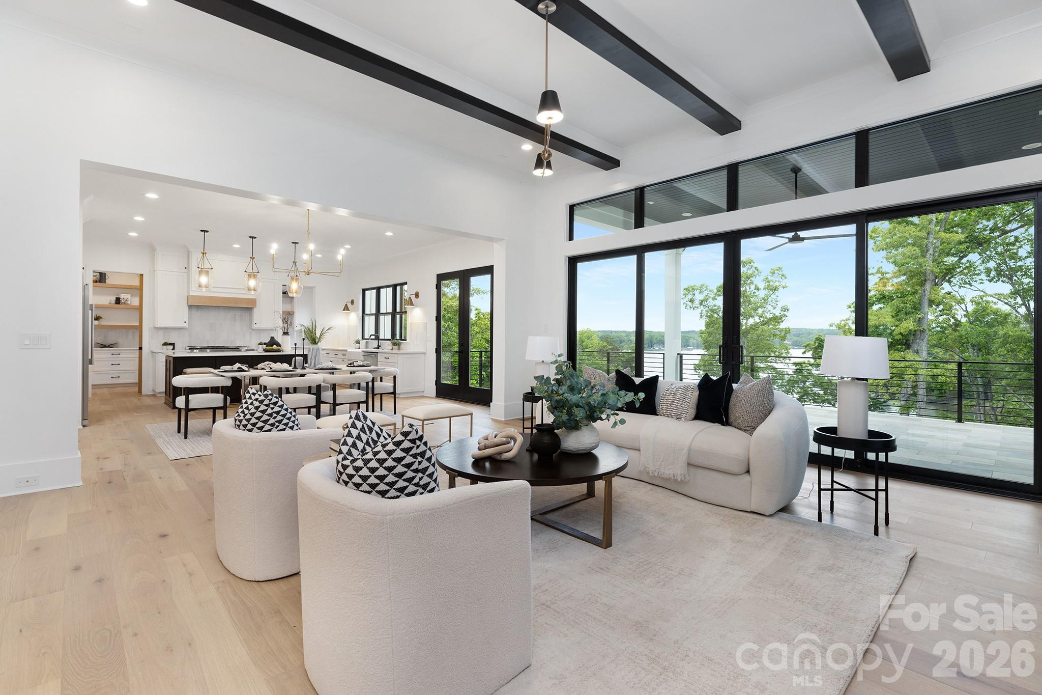 18304 Rosapenny Road Charlotte, NC 28278 - Photo 19 of 48 a living room with furniture and a large window