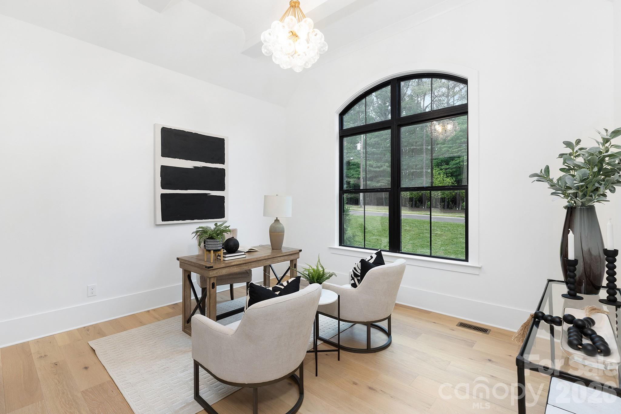 18304 Rosapenny Road Charlotte, NC 28278 - Photo 27 of 48 a living room with furniture and window