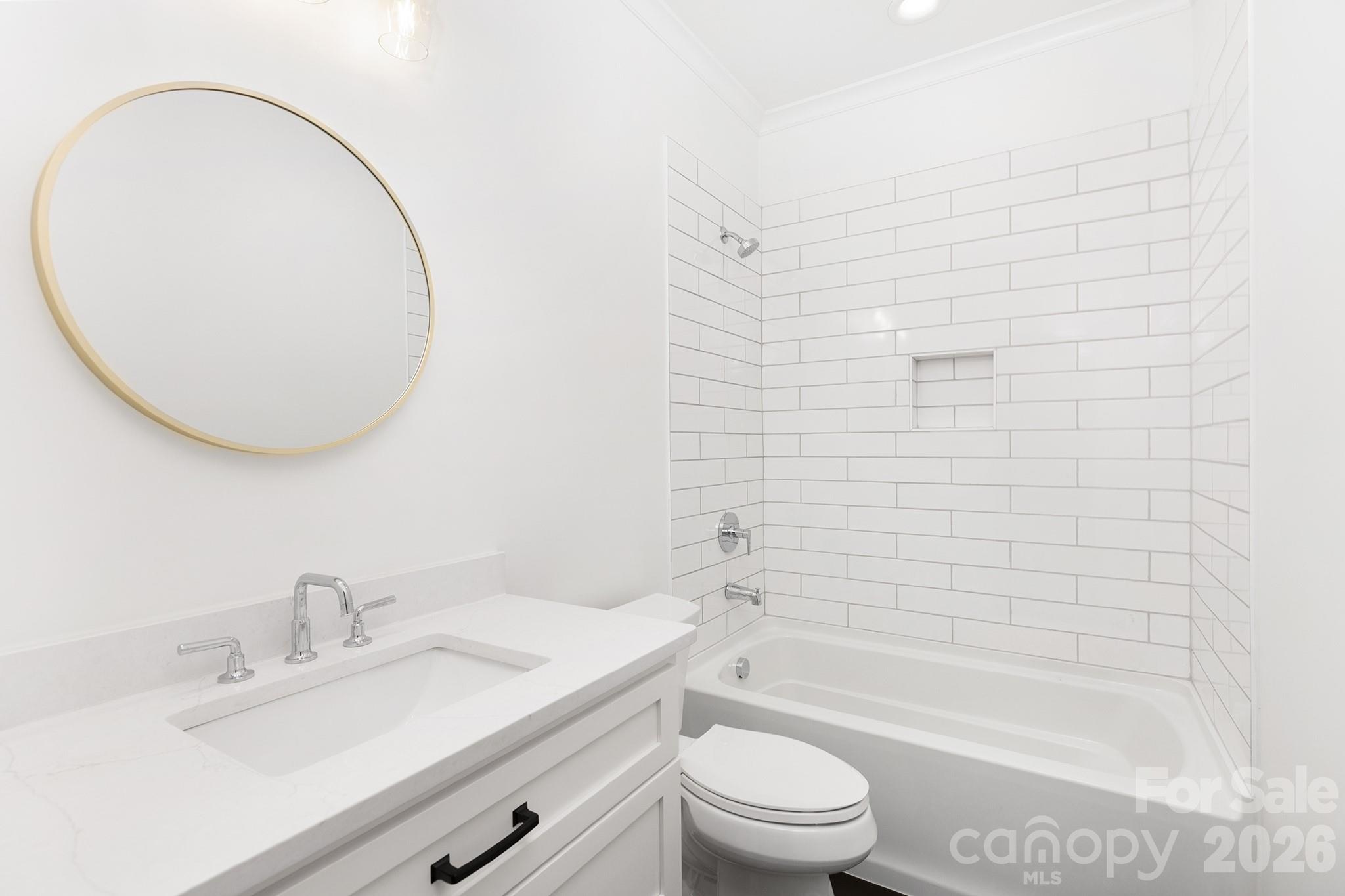 18304 Rosapenny Road Charlotte, NC 28278 - Photo 39 of 48 a bathroom with a sink toilet and shower