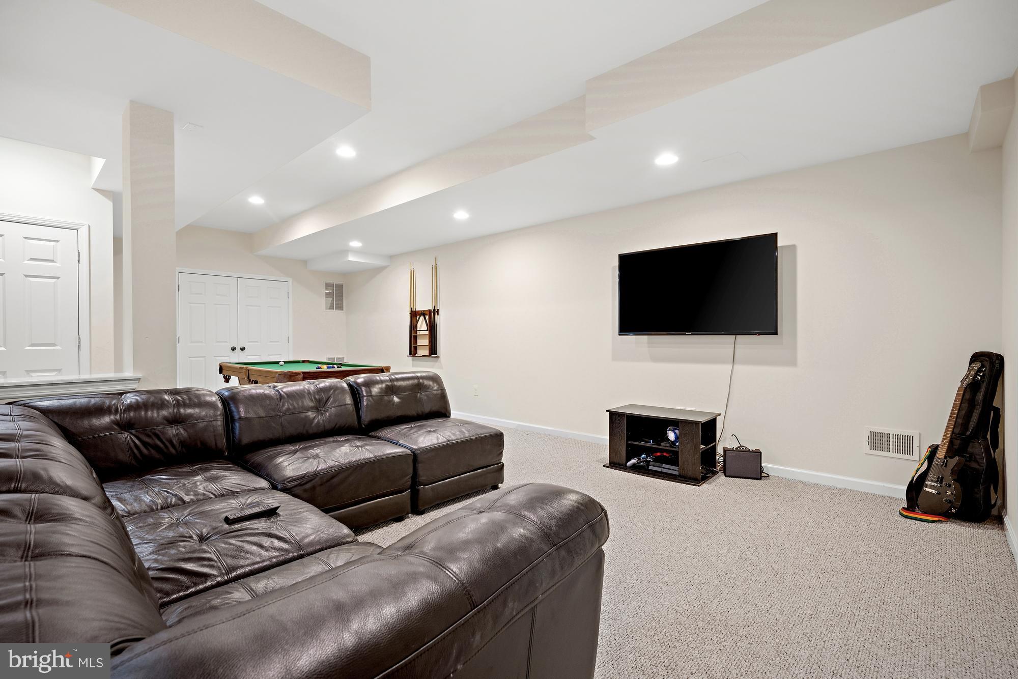 44 Roanoke Road Belle Mead, NJ 08502 - Photo 40 of 43 TV section in finished lower level.