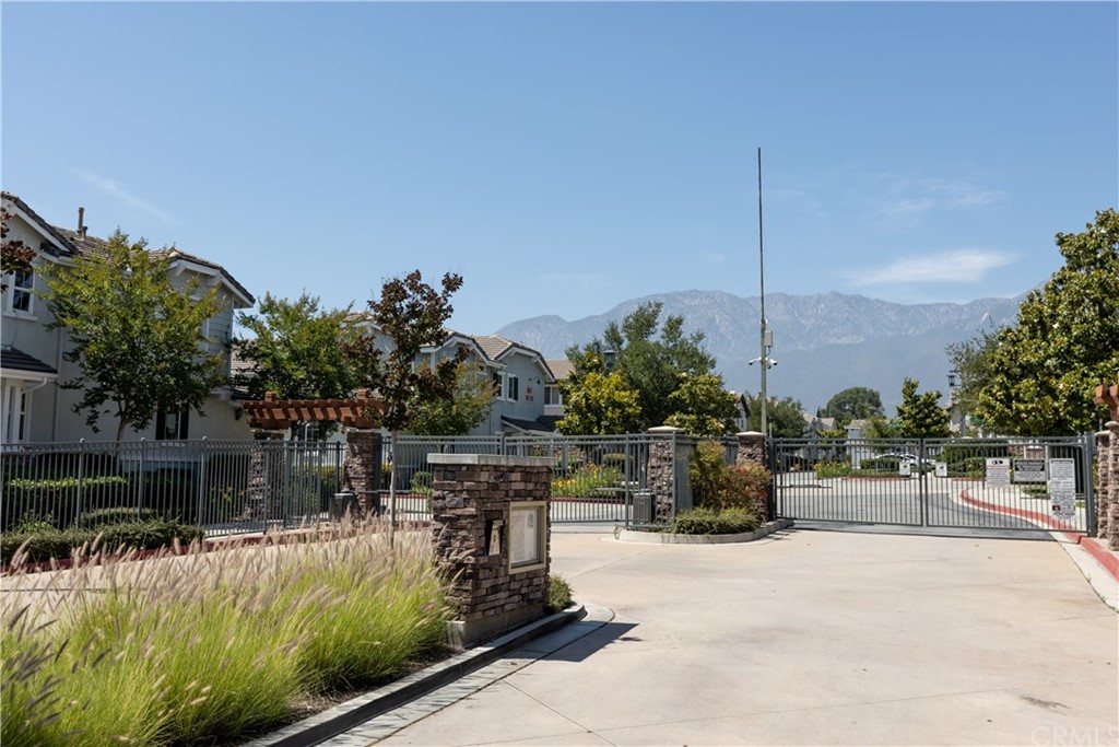 8024 Tulsa Place, Unit 107 Rancho Cucamonga, CA 91730 - Photo 27 of 35 a view of a swimming pool with a patio