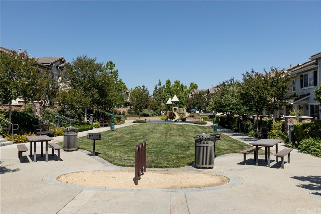 8024 Tulsa Place, Unit 107 Rancho Cucamonga, CA 91730 - Photo 30 of 35 a view of a park with benches
