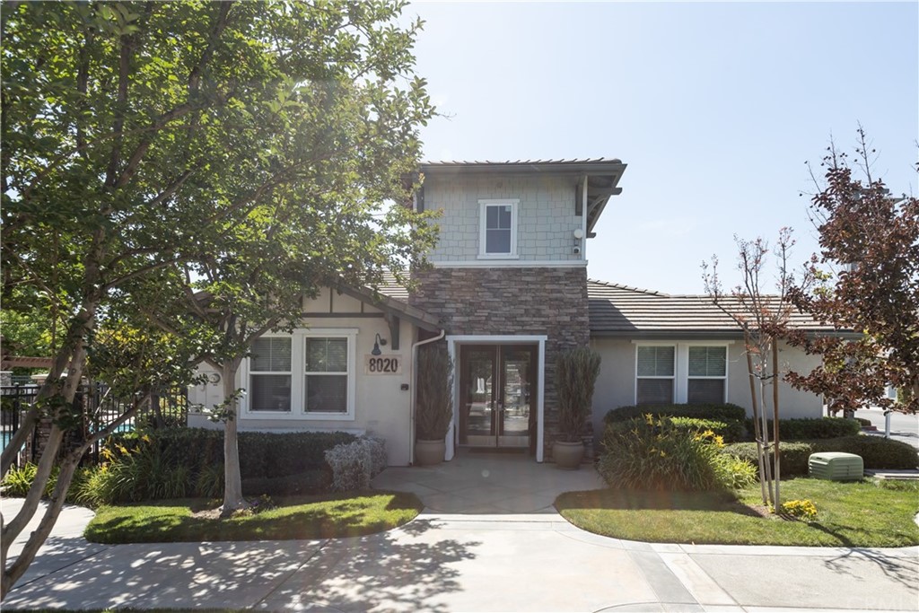8024 Tulsa Place, Unit 107 Rancho Cucamonga, CA 91730 - Photo 33 of 35 a front view of a house with garden
