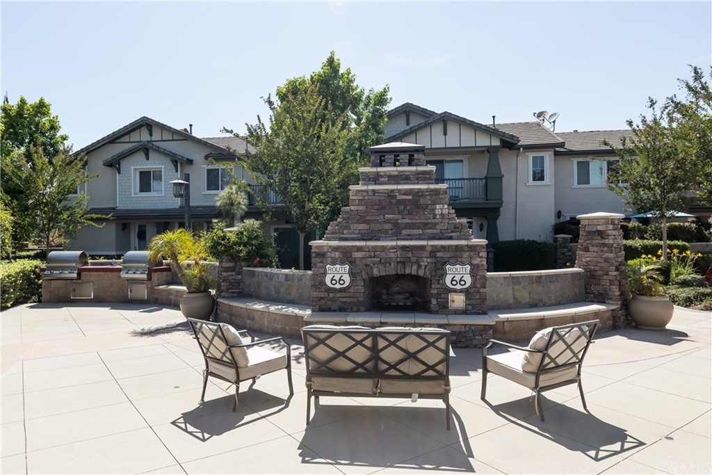 8024 Tulsa Place, Unit 107 Rancho Cucamonga, CA 91730 - Photo 34 of 35 a front view of a house with sitting area