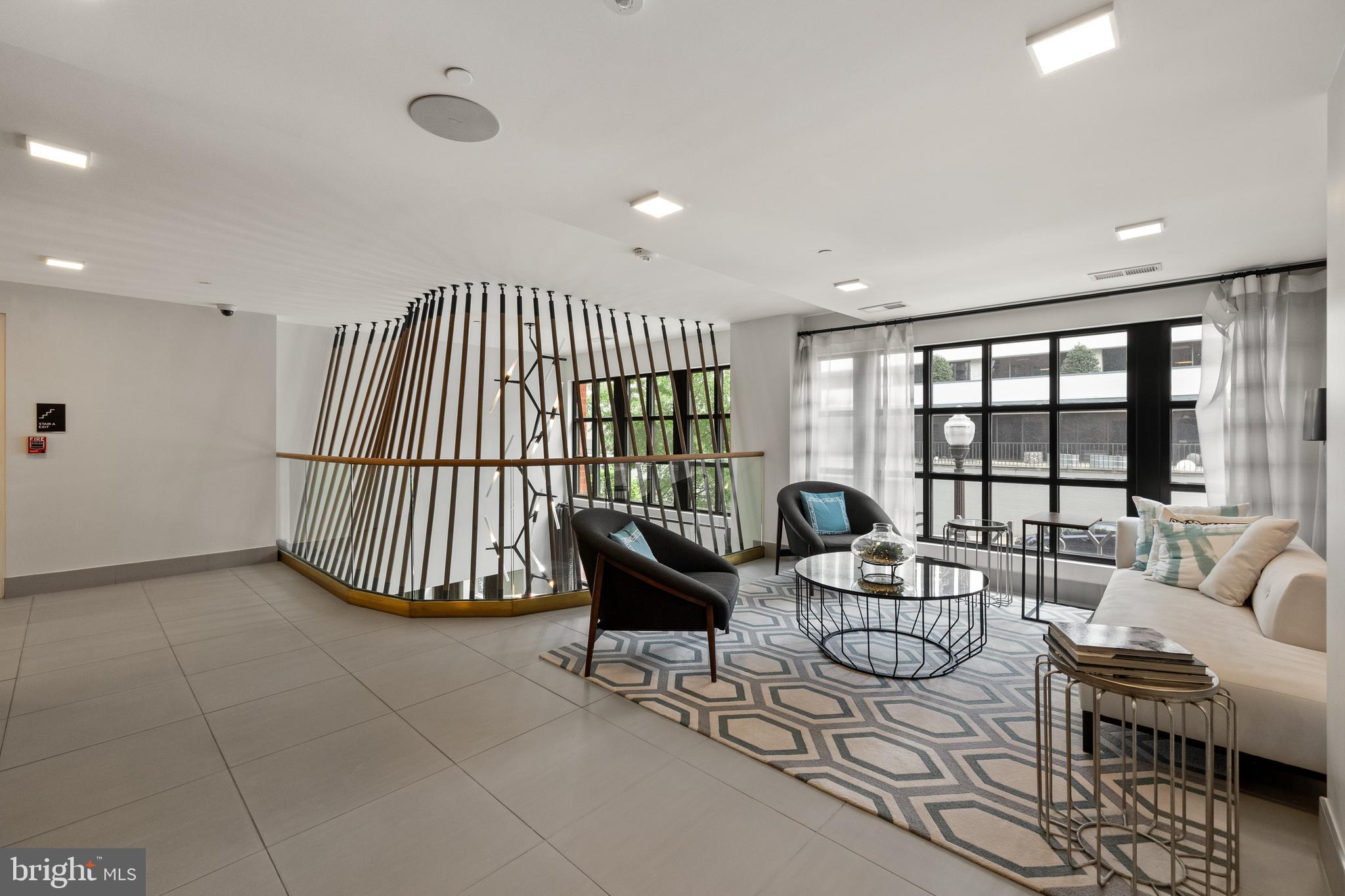 1411 Key Boulevard, Unit 304 Arlington, VA 22209 - Photo 44 of 57 a living room with furniture