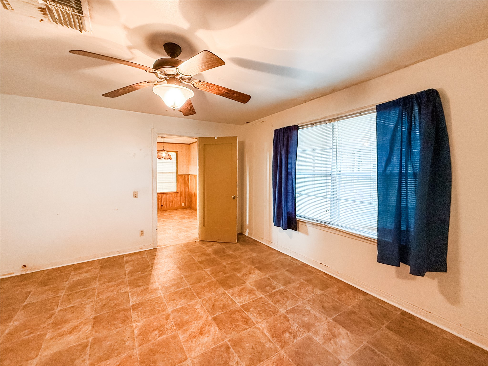 1002 Neiser Lane Weimar, TX 78962 - Photo 9 of 23 a view of an empty room with a window