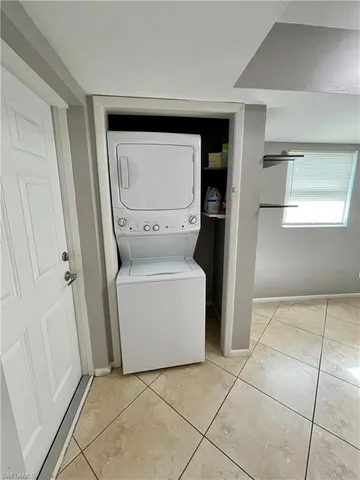 a utility room with washer and dryer