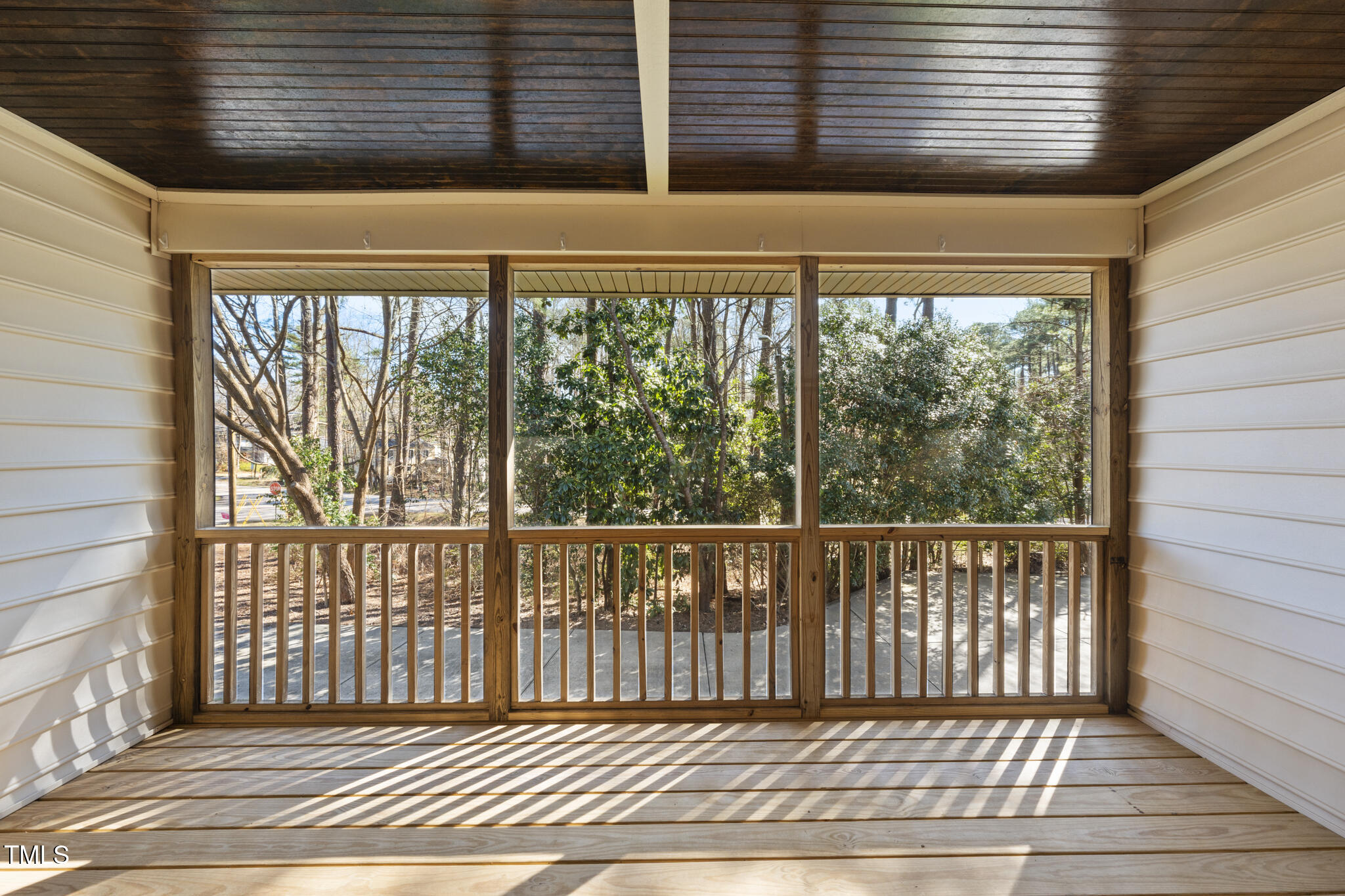 6301 King Lawrence Road Raleigh, NC 27607 - Photo 29 of 79 Private Screened in Porch off Primary Bedroom