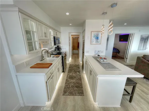 a spacious bathroom with sink double vanity