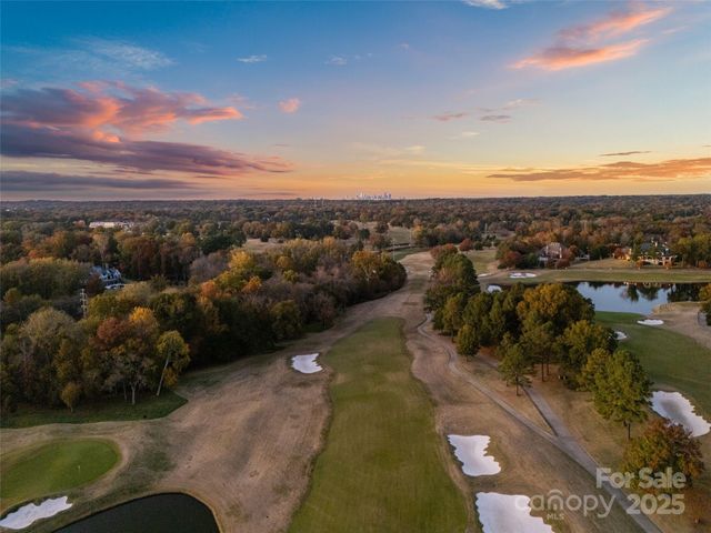 a view of a lake with a city