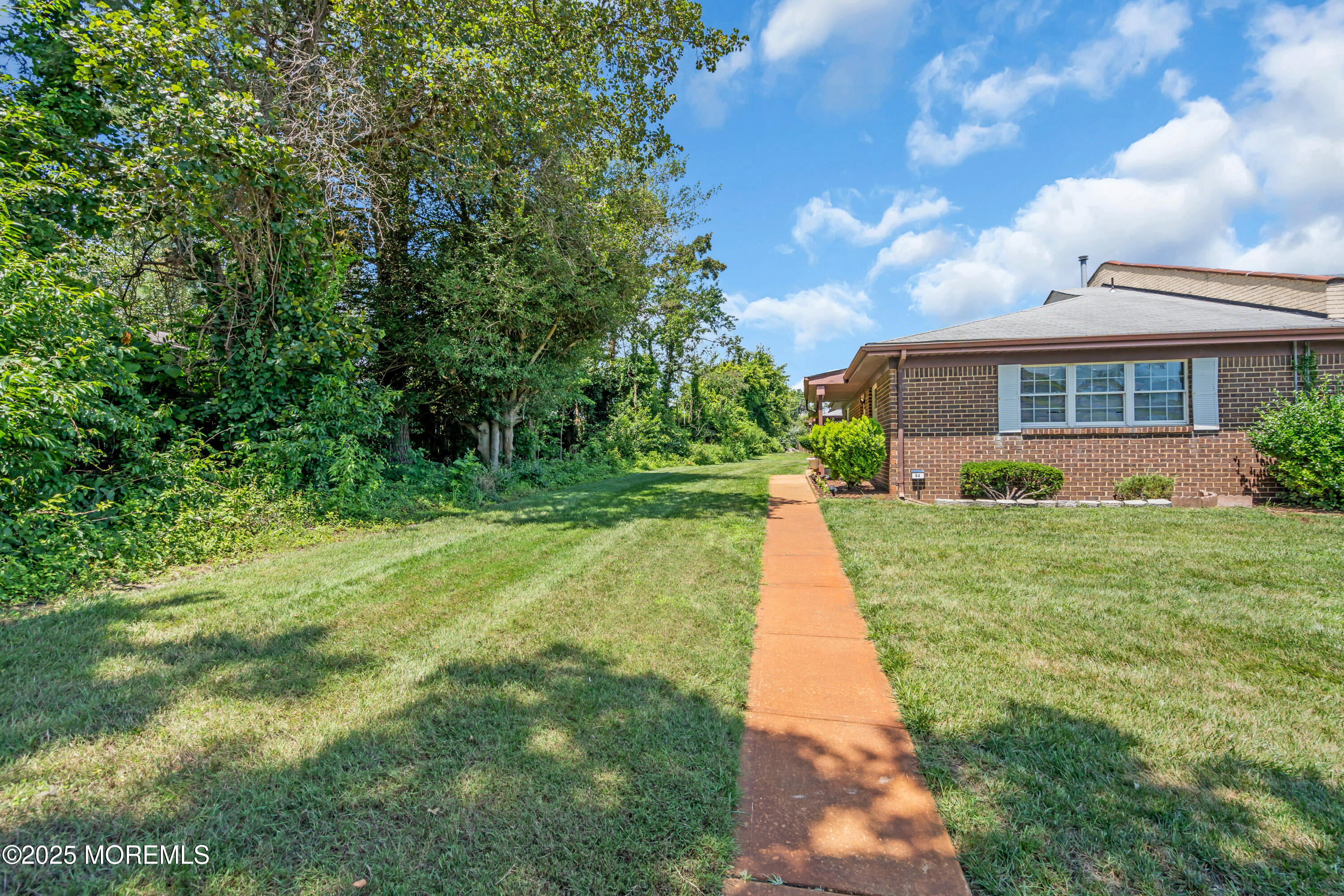 94 Greenwood Loop Road Brick, NJ 08724 - Photo 21 of 22 a front view of house with yard