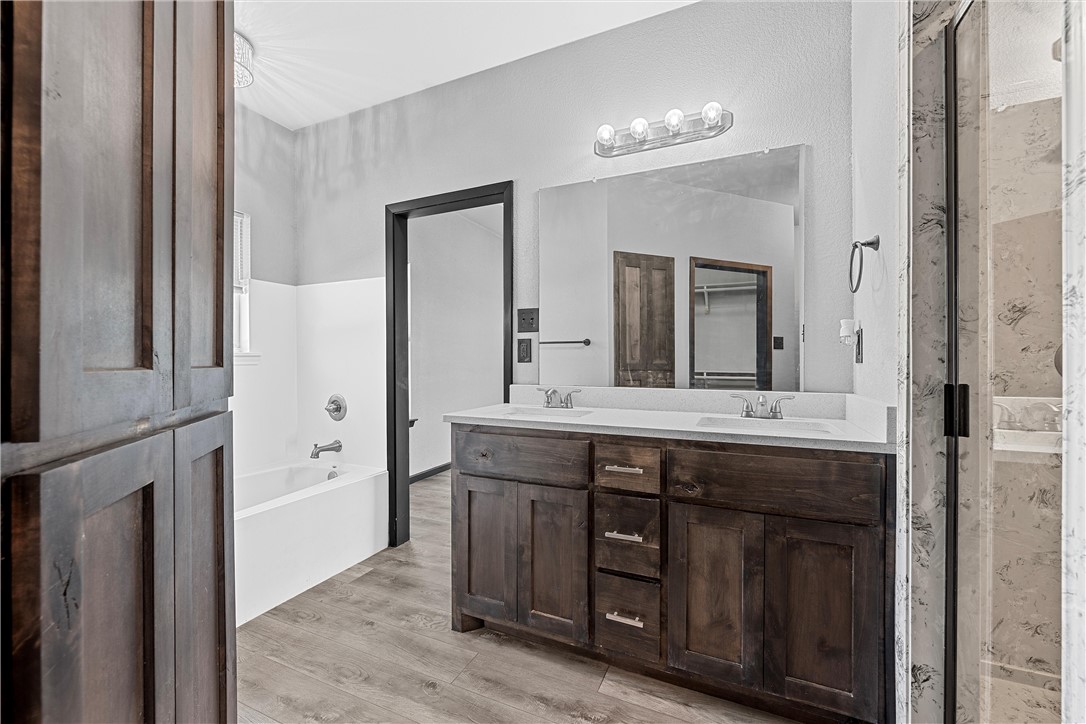 778 Rivercrest Road Valley Mills, TX 76689 - Photo 20 of 66 a spacious bathroom with a double vanity sink and a mirror