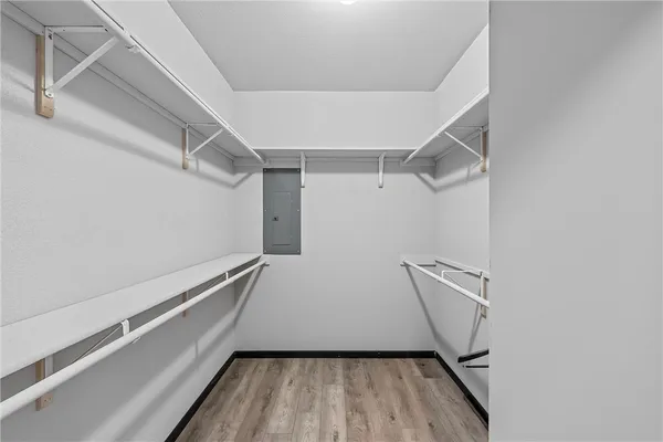 a view of an empty room with a flat screen tv