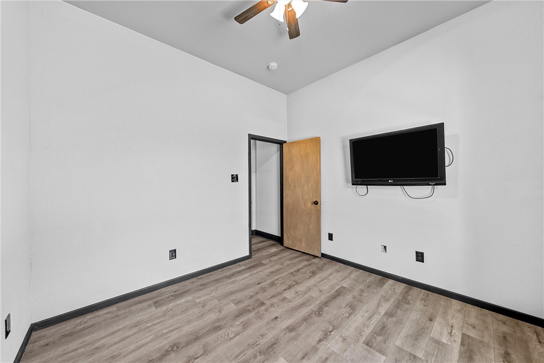 778 Rivercrest Road Valley Mills, TX 76689 - Photo 29 of 66 a view of an empty room with a flat screen tv