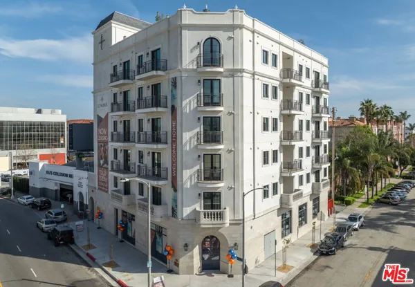 a front view of a building with a street