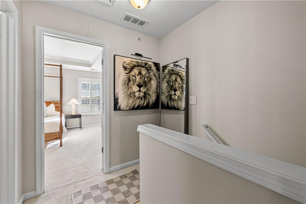 100 Portico Place Newnan, GA 30265 - Photo 18 of 51 a view of a hallway with white walls and white walls