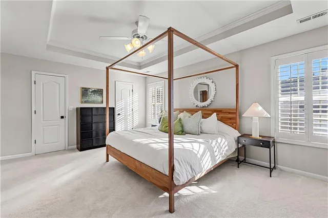 a bedroom with a bed bed and a closet