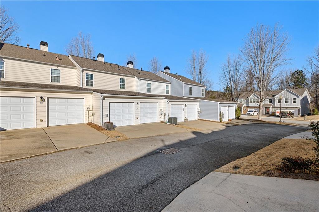 100 Portico Place Newnan, GA 30265 - Photo 33 of 51 a large white building with a large window