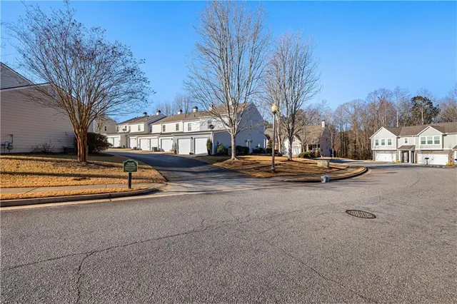 a view of a street with houses