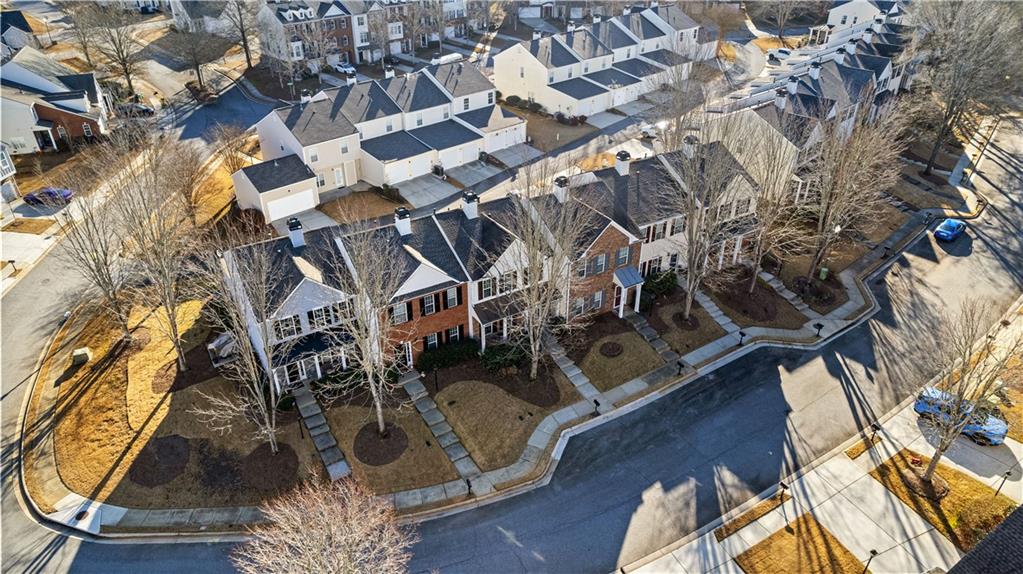 100 Portico Place Newnan, GA 30265 - Photo 39 of 51 an aerial view of a house with a swimming pool