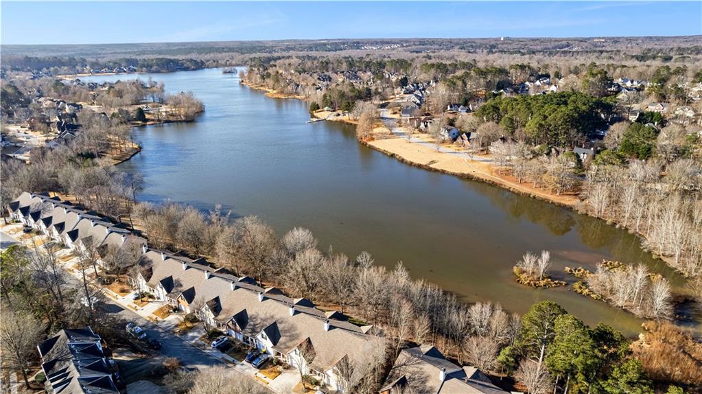 100 Portico Place Newnan, GA 30265 - Photo 43 of 51 an aerial view of a house with a lake view