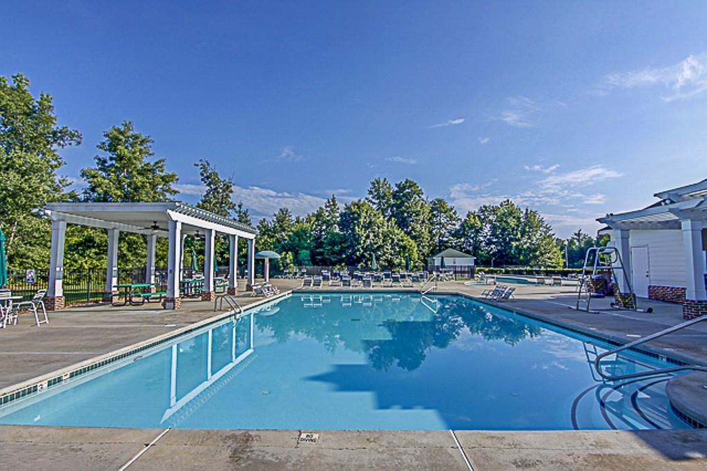 100 Portico Place Newnan, GA 30265 - Photo 47 of 51 a view of a swimming pool with a patio