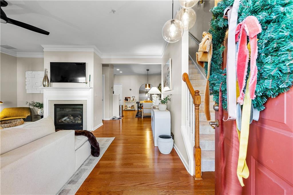 100 Portico Place Newnan, GA 30265 - Photo 6 of 51 a living room with furniture fireplace and flat screen tv