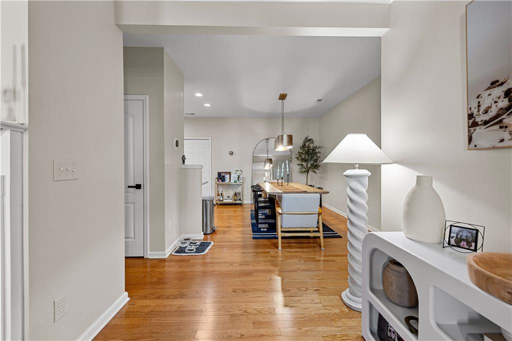 100 Portico Place Newnan, GA 30265 - Photo 10 of 51 a living room with furniture and a fireplace