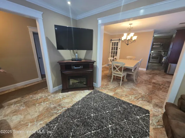 a kitchen with a sink stove top oven and cabinets