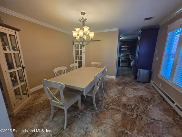 a bed room with a bed and a ceiling fan