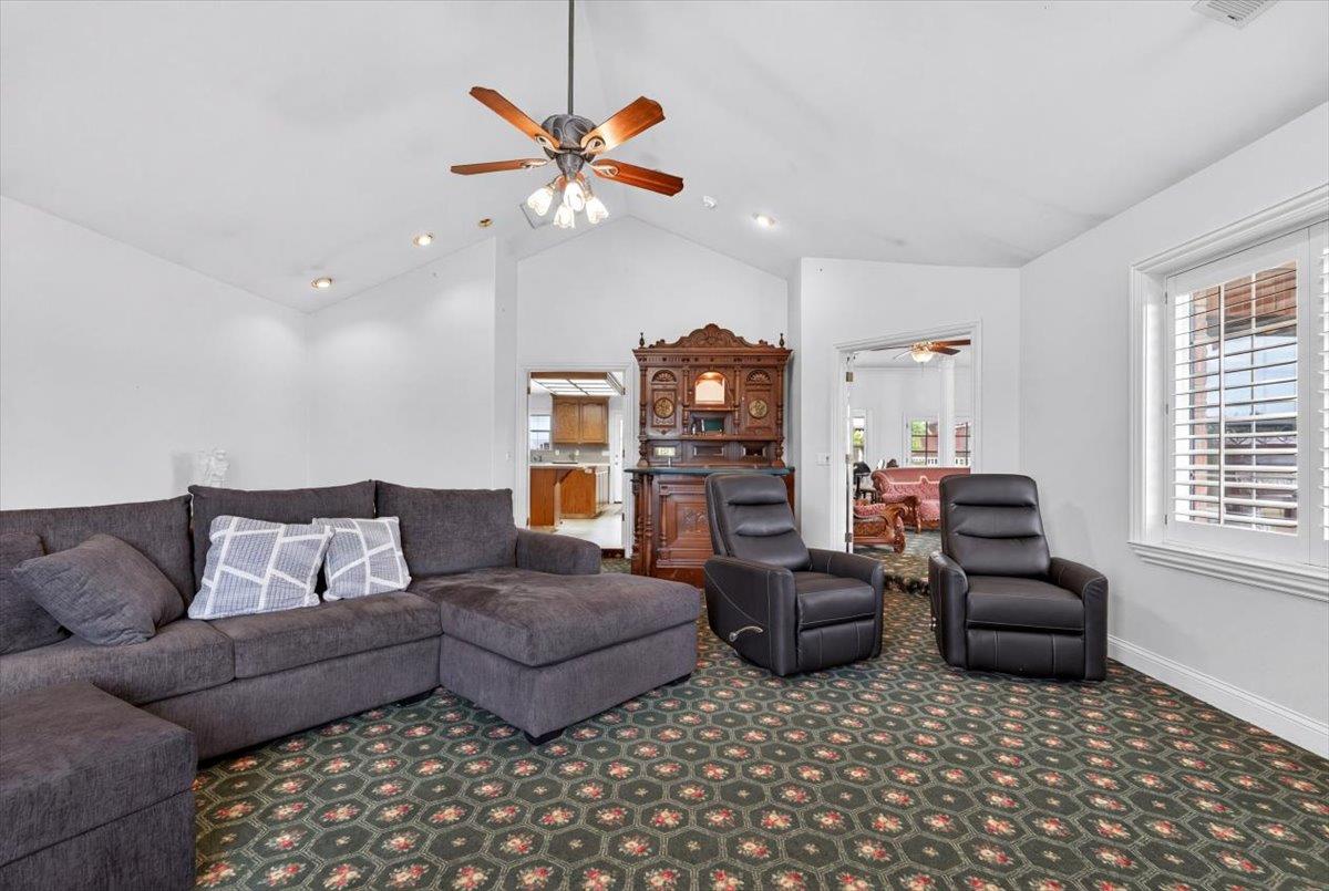 30324 Lone Tree Road Oakdale, CA 95361 - Photo 13 of 74 a living room with furniture and a window