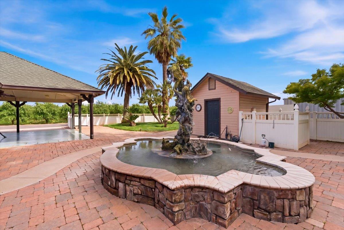 30324 Lone Tree Road Oakdale, CA 95361 - Photo 41 of 74 a view of a house with backyard patio and swimming pool