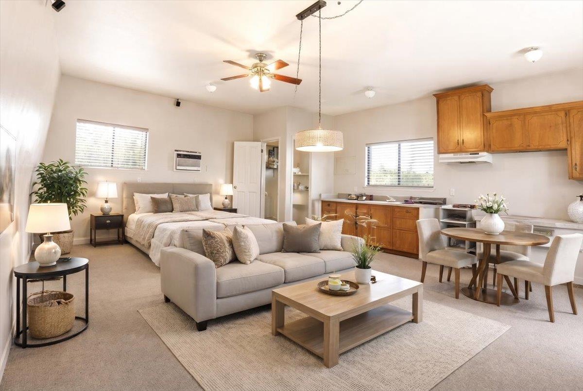 30324 Lone Tree Road Oakdale, CA 95361 - Photo 48 of 74 a living room with furniture kitchen view and a wooden floor