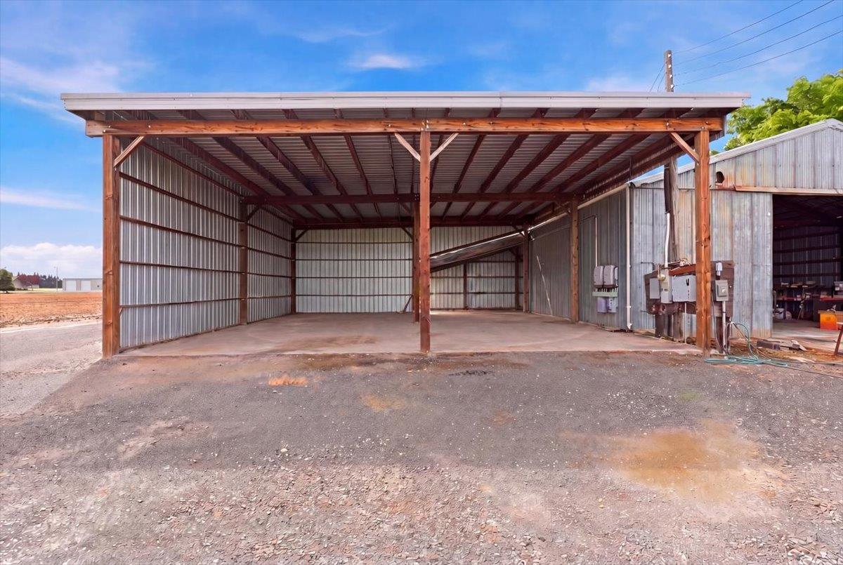 30324 Lone Tree Road Oakdale, CA 95361 - Photo 59 of 74 a view of a room with wooden walls