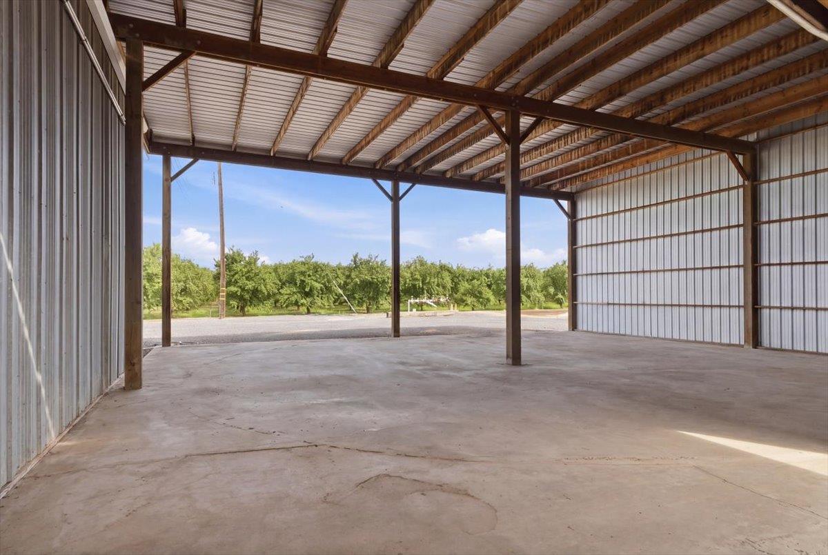 30324 Lone Tree Road Oakdale, CA 95361 - Photo 60 of 74 a view of a room with wooden walls