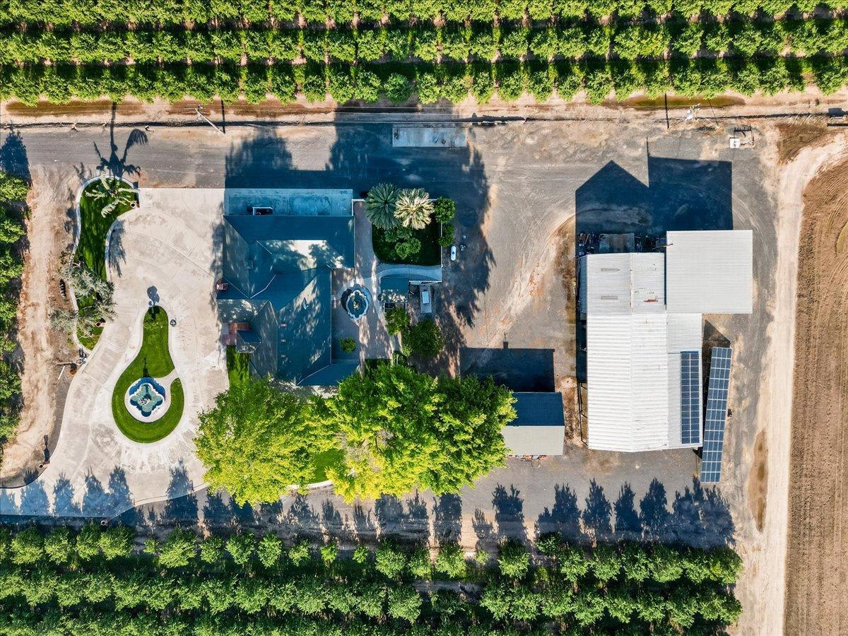 30324 Lone Tree Road Oakdale, CA 95361 - Photo 63 of 74 an aerial view of a house with garden space and sitting area